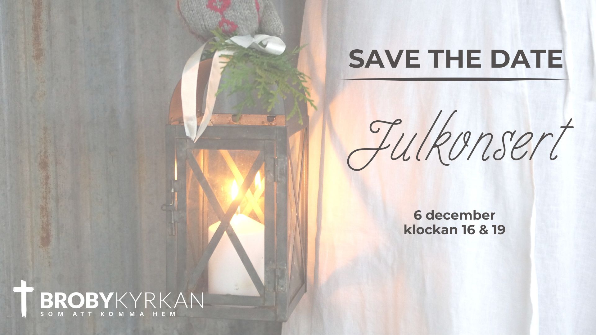 Bilden visar en ljuslykta med ett brinnande ljus